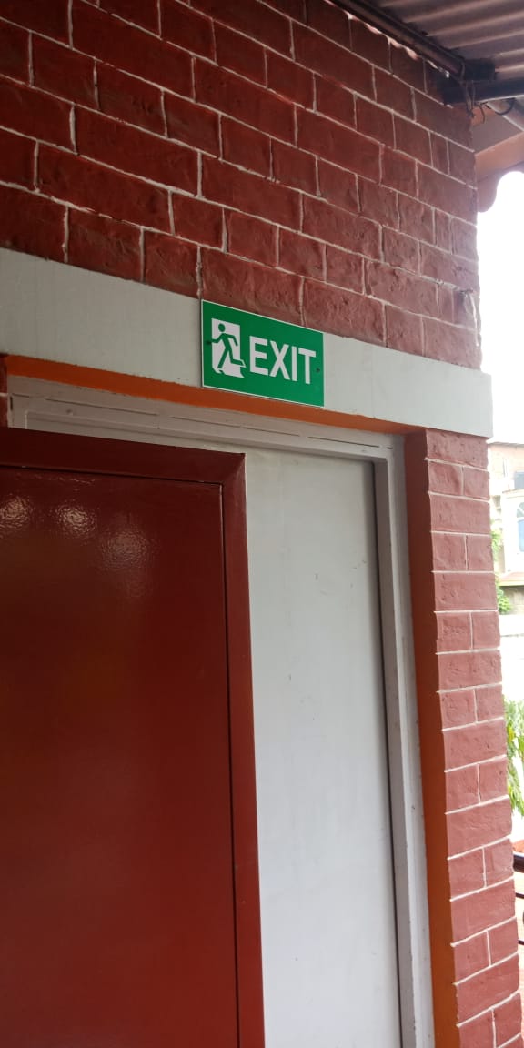 Exit ACP Plate fixed over door at Sherwood School Dehradun