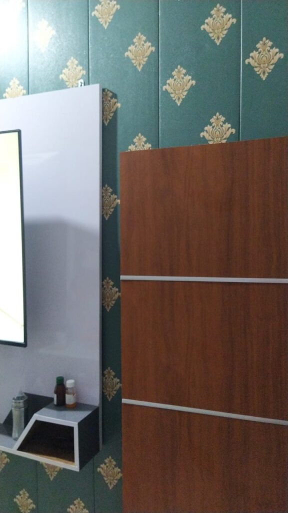 TV Panel also designed with light color shade. We have provided 2 color scheme to the room Turquoise for front and back walls and Light Beige on Side Walls.