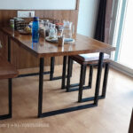 Solidwood Dining table with metal frame.