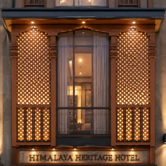 Modern Garhwali ACP facade design with CNC jali pattern for hotel elevation in Dehradun Uttarakhand